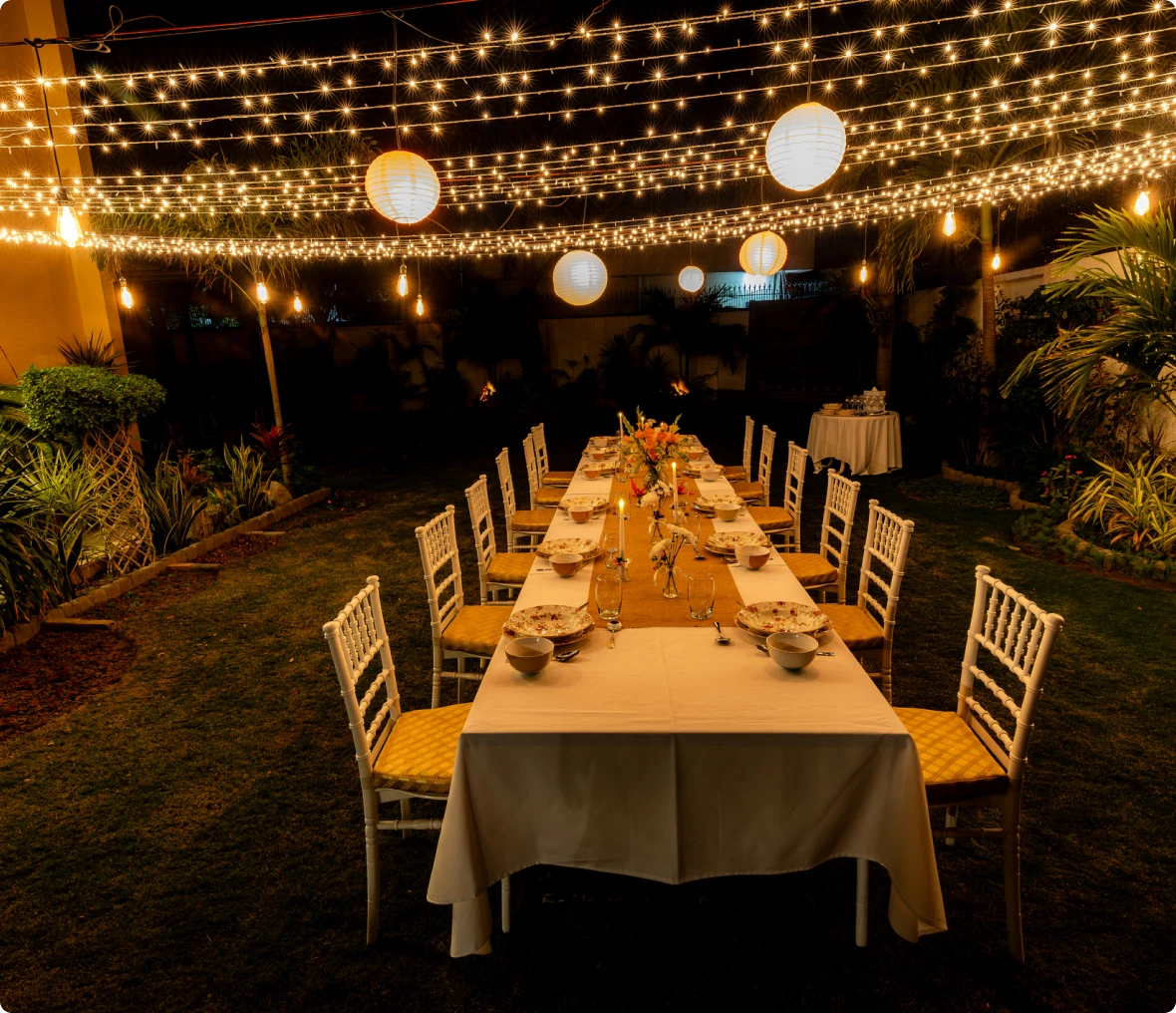 Nighttime garden event with festive decor