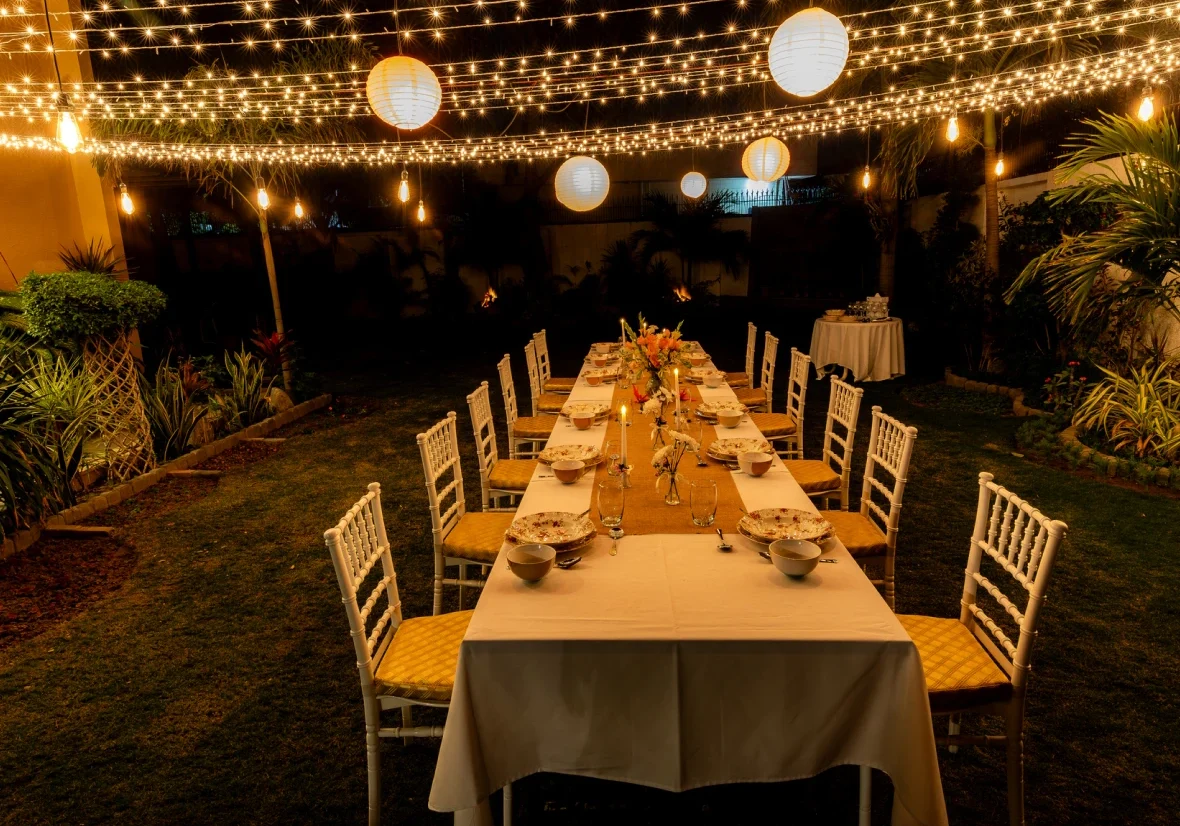 Nighttime garden event with festive decor
